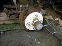 Teeny tiny drum brake.