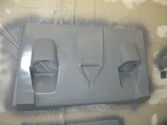 One coat of epoxy primer on top of some plastic adheasion promoter.